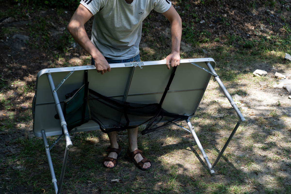 Folding table for outdoor recreation